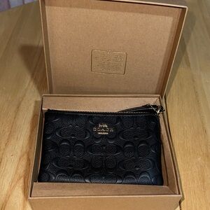 Coach Black Embossed Signature Leather Pouch with Gold Hardware